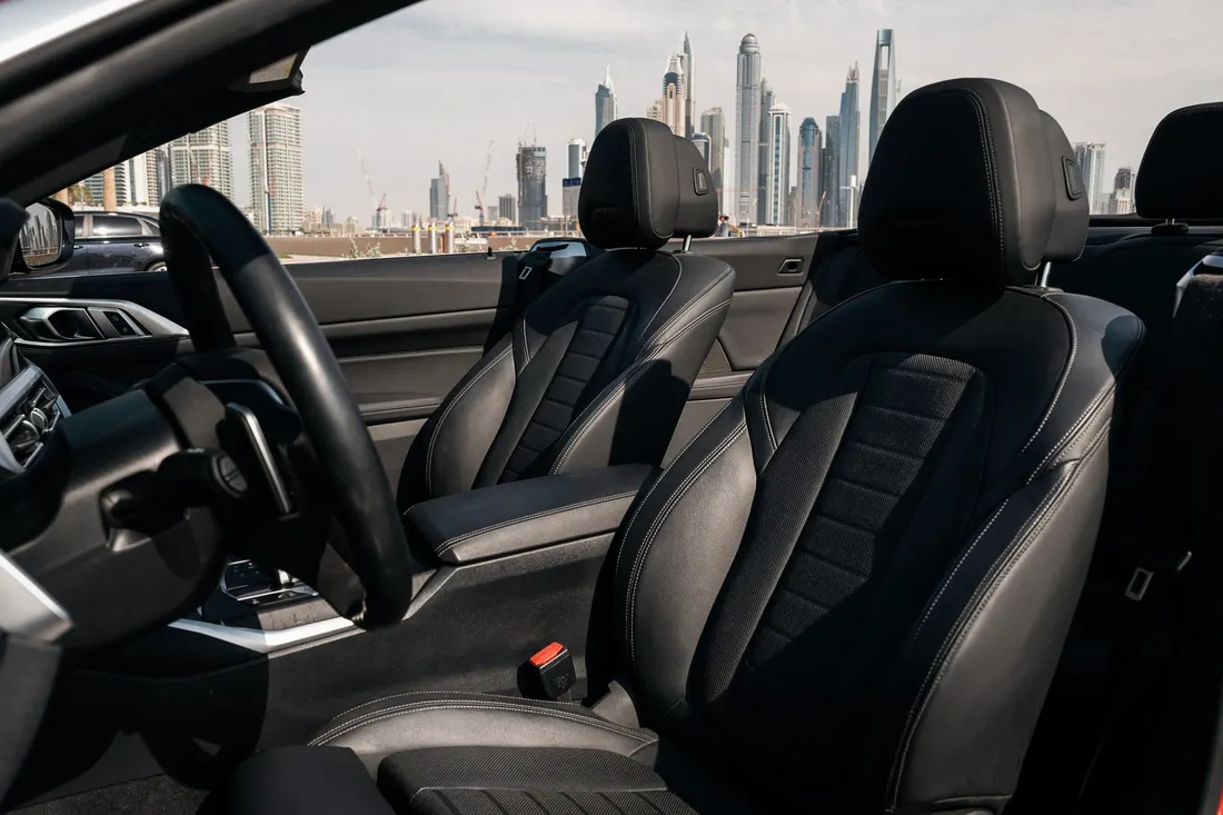 BMW 430i Convertible — front seats with the roof open
