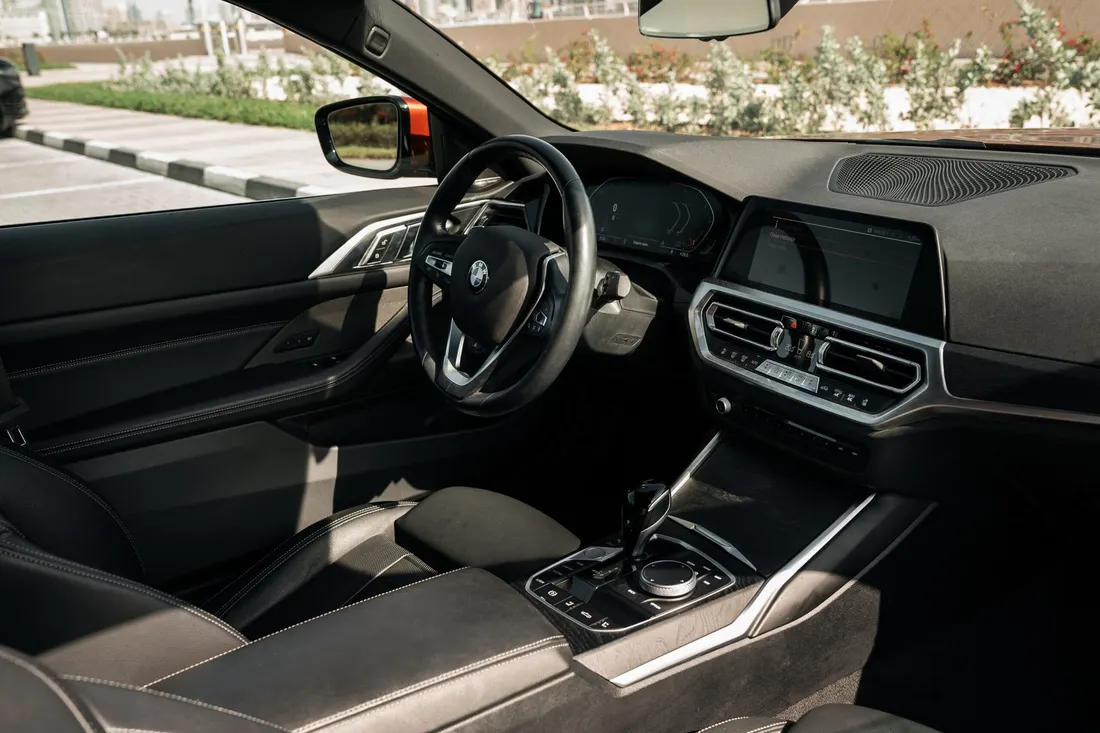 BMW 430i Convertible — dashboard and gear selector from the passenger side