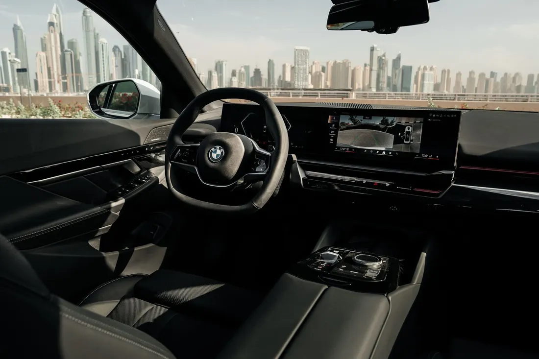 BMW 530i — dashboard and steering wheel from the passenger side