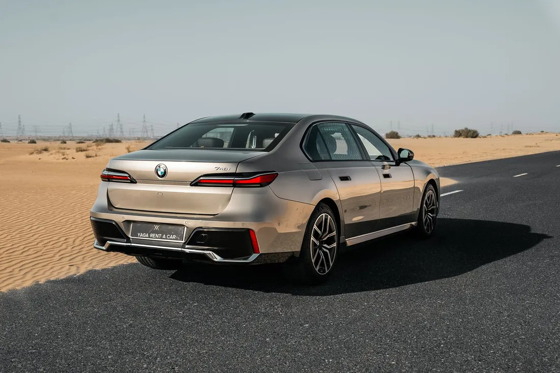 BMW 740i — opposite rear three-quarter exterior