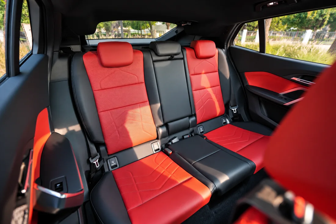 BMW X2 White — red and black rear seating