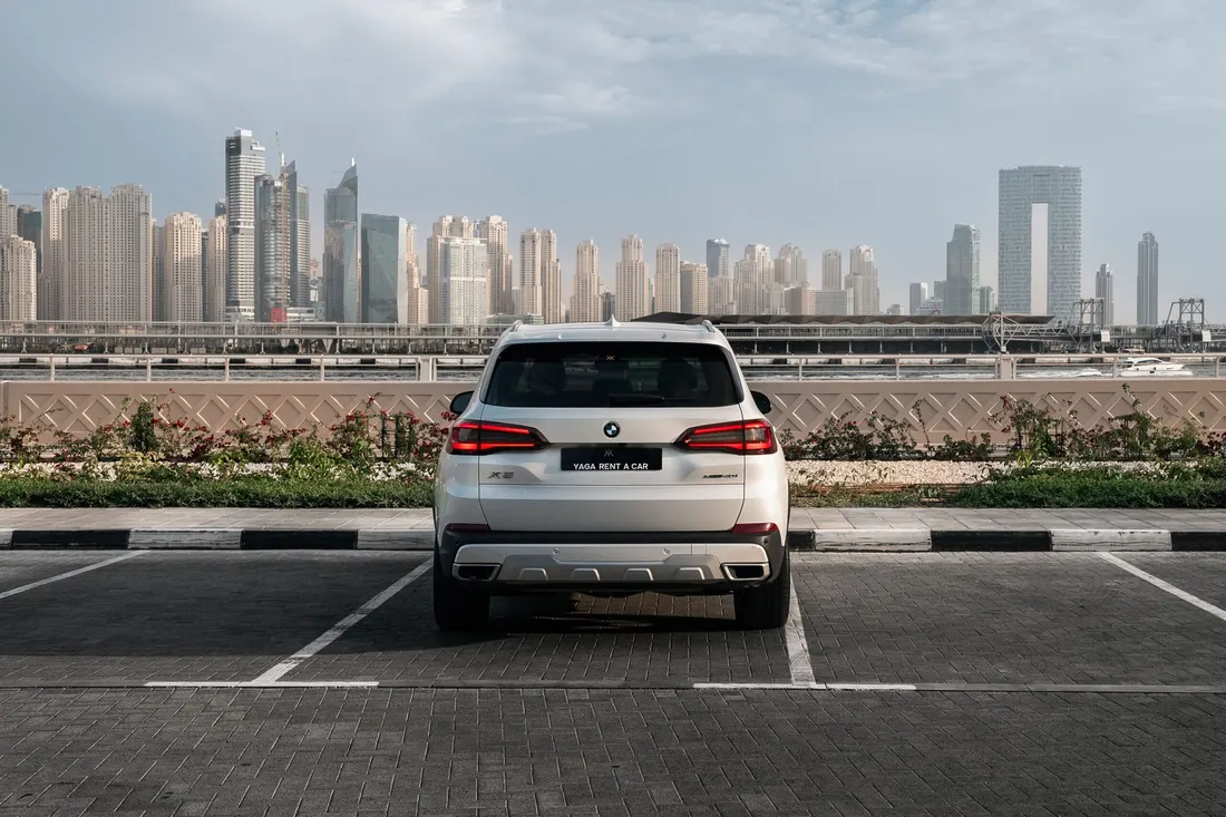 BMW X5 xDrive 40i — rear exterior facing the waterfront