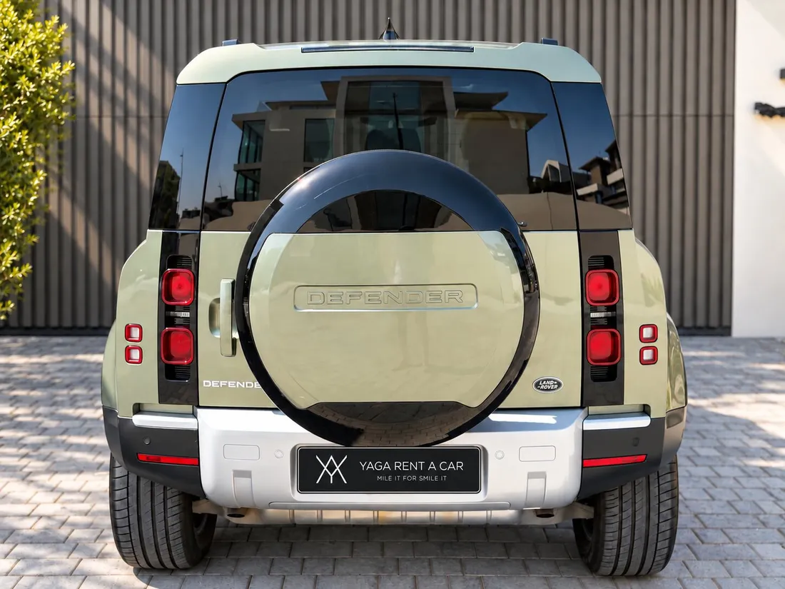 Land Rover Defender 7 Seats — rear exterior with tailgate-mounted spare wheel