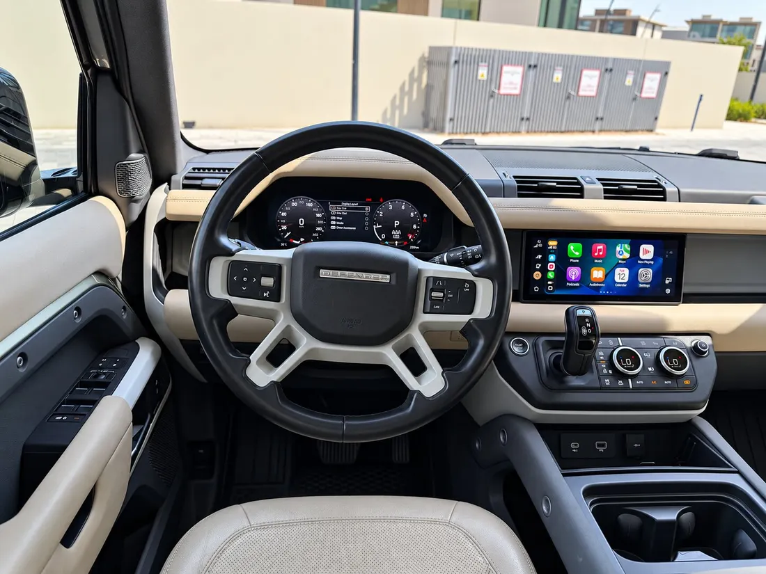 Land Rover Defender 7 Seats — driver instrument panel and touchscreen