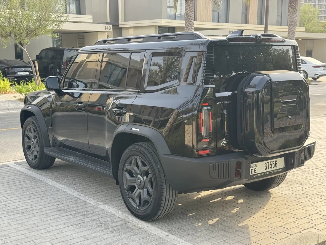 Jetour T2 Green Interior — opposite rear three-quarter exterior and tail lights