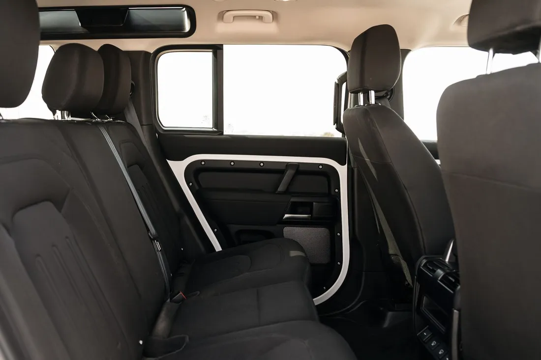Land Rover Defender — rear bench seats and door trim
