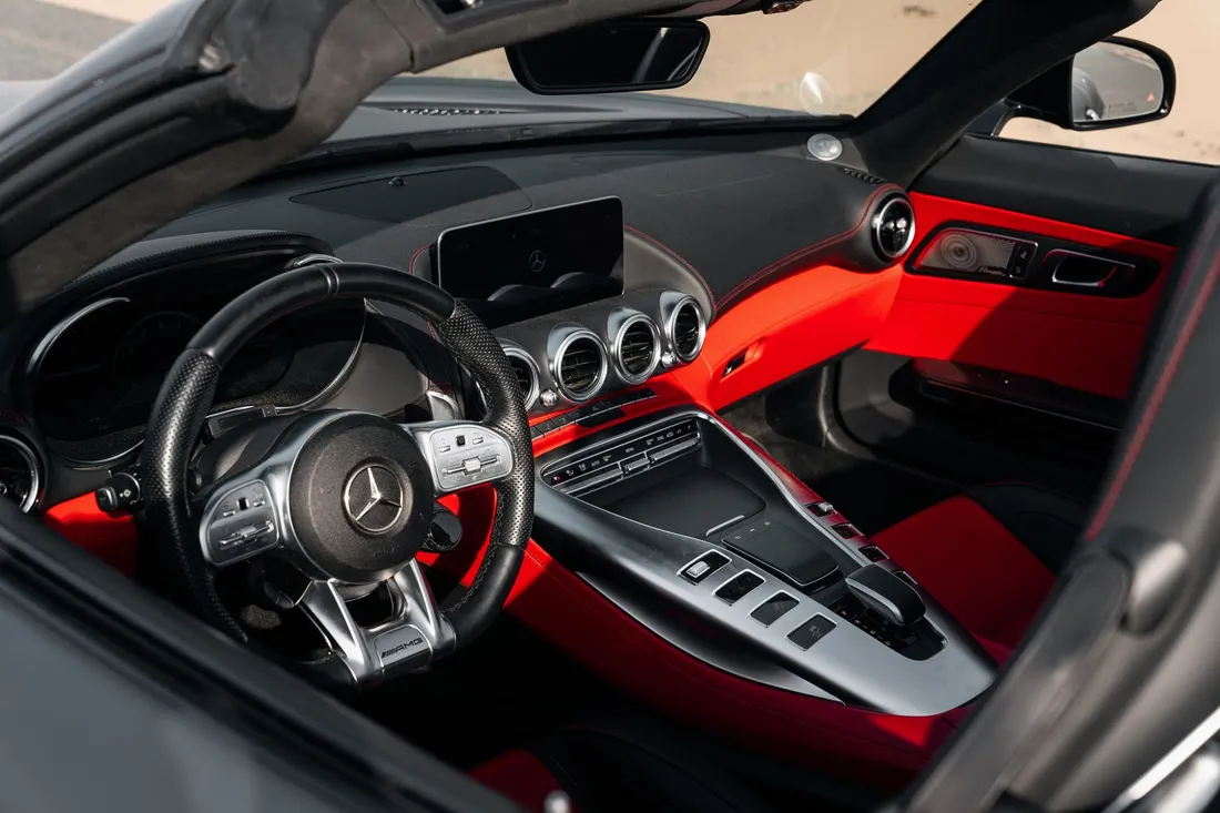 Mercedes-AMG GTC — steering wheel and dashboard with red cabin trim