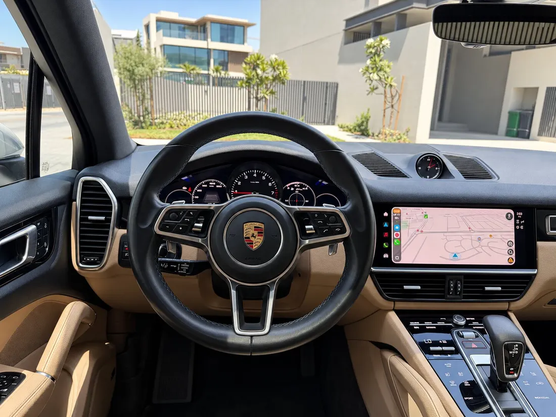 Porsche Cayenne S — steering wheel and instrument panel from the driver seat